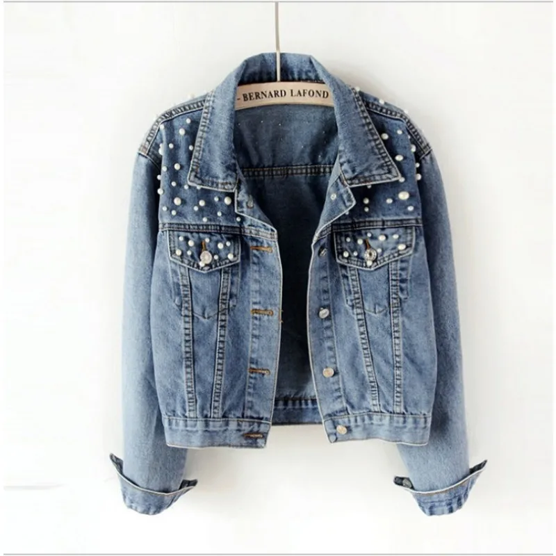 Chic women’s denim jacket with beaded pearls, perfect for layering in spring and summer.