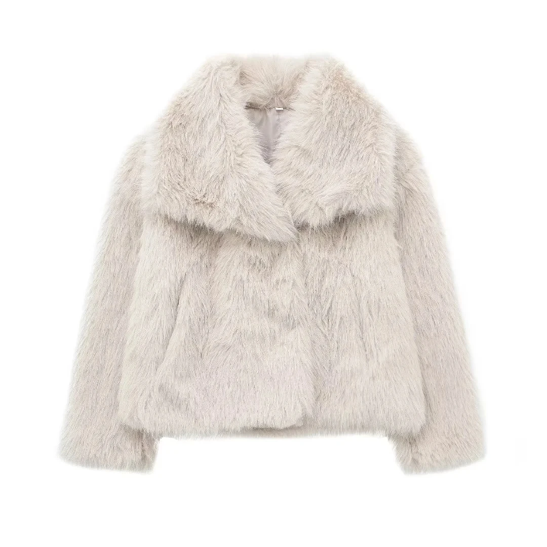 Stay warm and stylish this winter in our cozy, oversized Faux Fur Jacket with pockets and a chic collar.