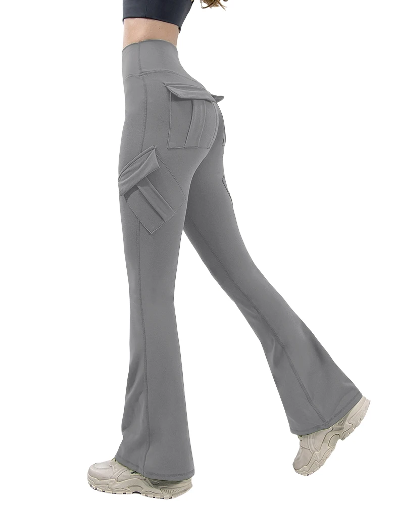 Versatile high stretch yoga leggings with pockets, wide leg cut, and a flattering mid-waist design.