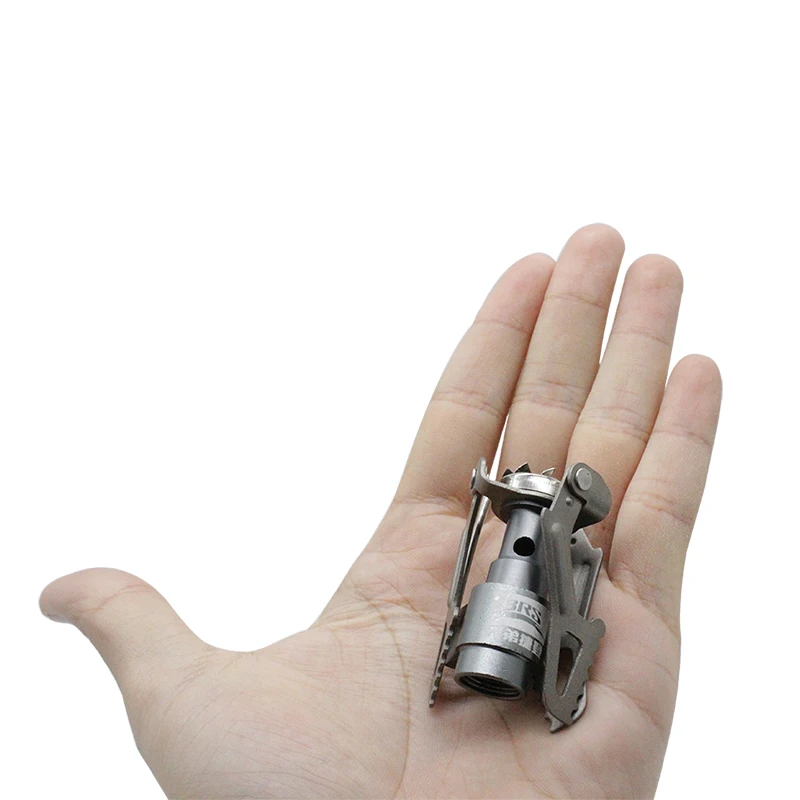 Ultralight titanium stove (25g) delivers 2700W power, perfect for outdoor cooking and adventures.